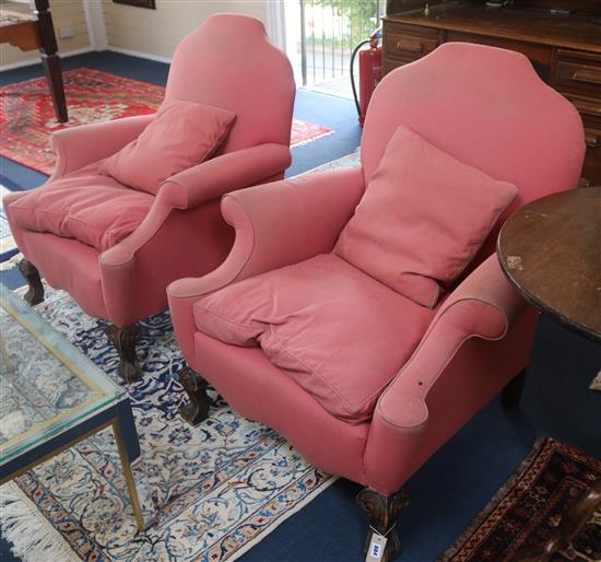 A pair of mahogany framed pink dralon upholstered armchairs